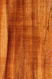 Hawaiian Koa laminate flooring with rich wood grain